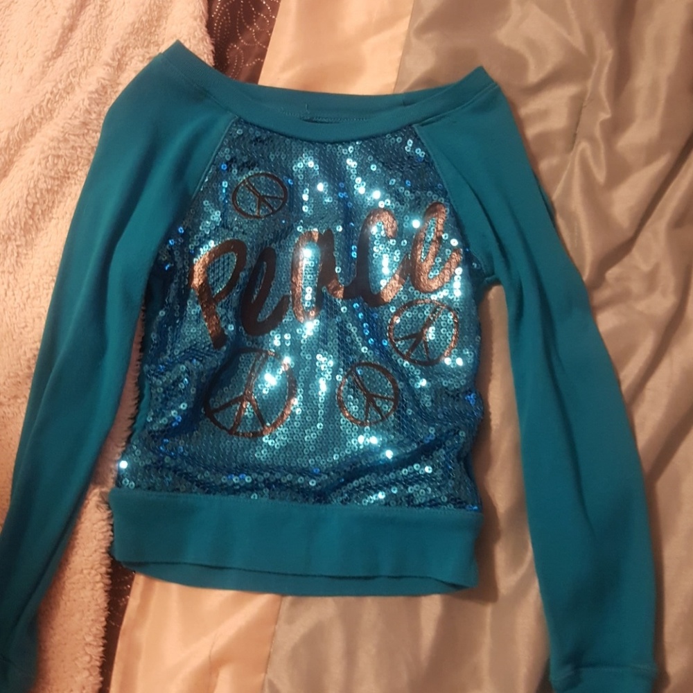 Blue long sleeve shirt with peace on front